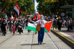 Woman at ceasefire in Gaza rally, Melbourne.
