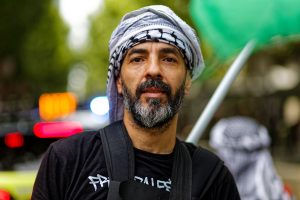 Drummer at the ceasefire now rally in Melbourne.