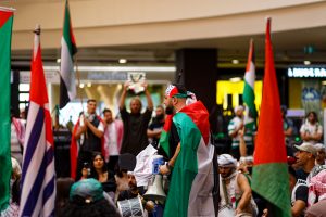 Hash Tayeh talking to the crowd at Melbourne Central Shopping Centre.
