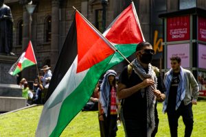 Crowd gathers at a Melbourne ceasefire now rally.