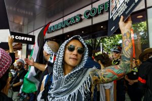 Calls to boycott Starbucks during a ceasefire now rally Melbourne.