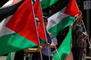 Crowd gathers at a Melbourne ceasefire now rally.