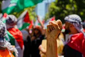 "Our existence is resistance". Fist in the air.