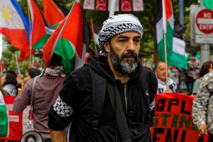 Protester at a ceasefire now rally, Melbourne.