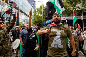 Burgertory owner Hash Tayeh at a ceasefire now rally, Melbourne.