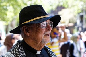 Anglican Priest Roger Featherston marching in solidarity with Palestinians.