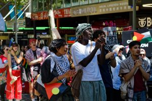 People marching for a Gaza Ceasefire.