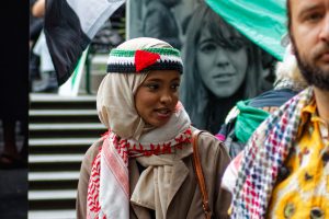 Woman at Melbourne's ceasefire now rally.