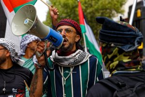 Man warming up the crowd in Melbourne.