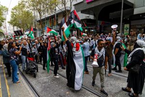 Man warming up the crowd in Melbourne.