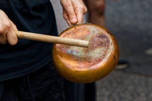 Banging pots and pans to remind Melbournians Israel is using starvation as a weapon of war.