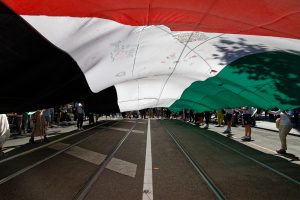 Wind under the giant Palestinian flag at #CeasefireNOW, Naarm (Melbourne).