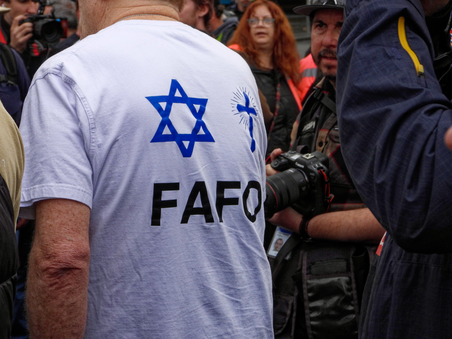 A Zionist wearing a Star of David with the 'Fuck Around, Find Out' acronym at the neo-Nazi march in Naarm/Melbourne. Photo: Aaron Smith